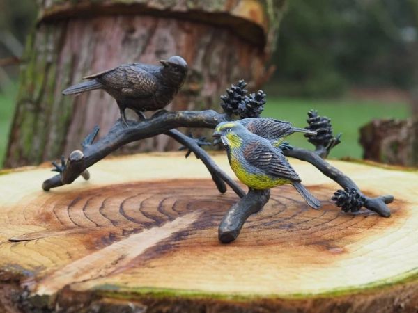 Bronzefigur Vögel auf Ast