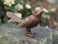 Bronzefigur kleiner stehender Vogel